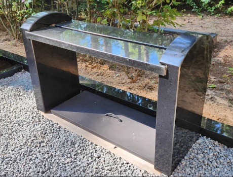 Granite cemetery bench with rounded legs
