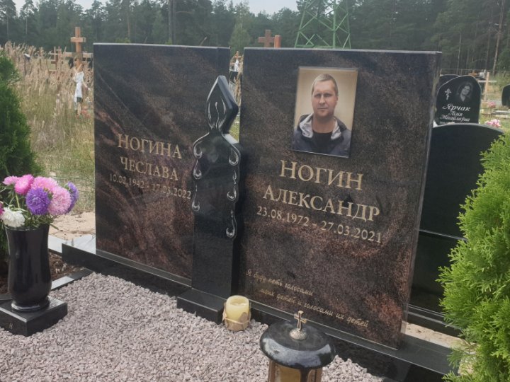 Granite gravestone with a granite candle